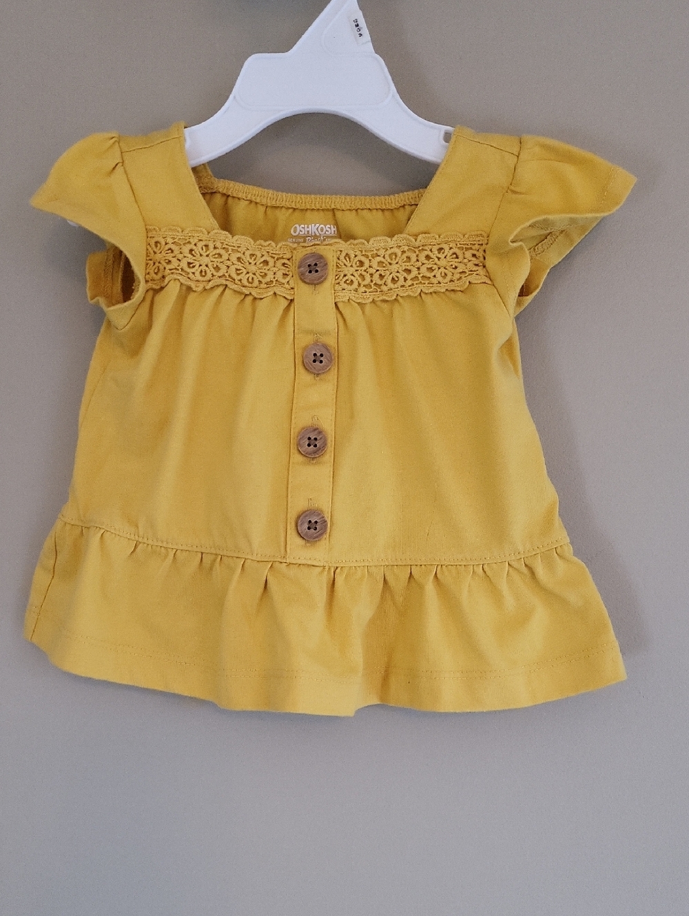 Super cute OshKosh B'gosh mustard yellow ruffle top